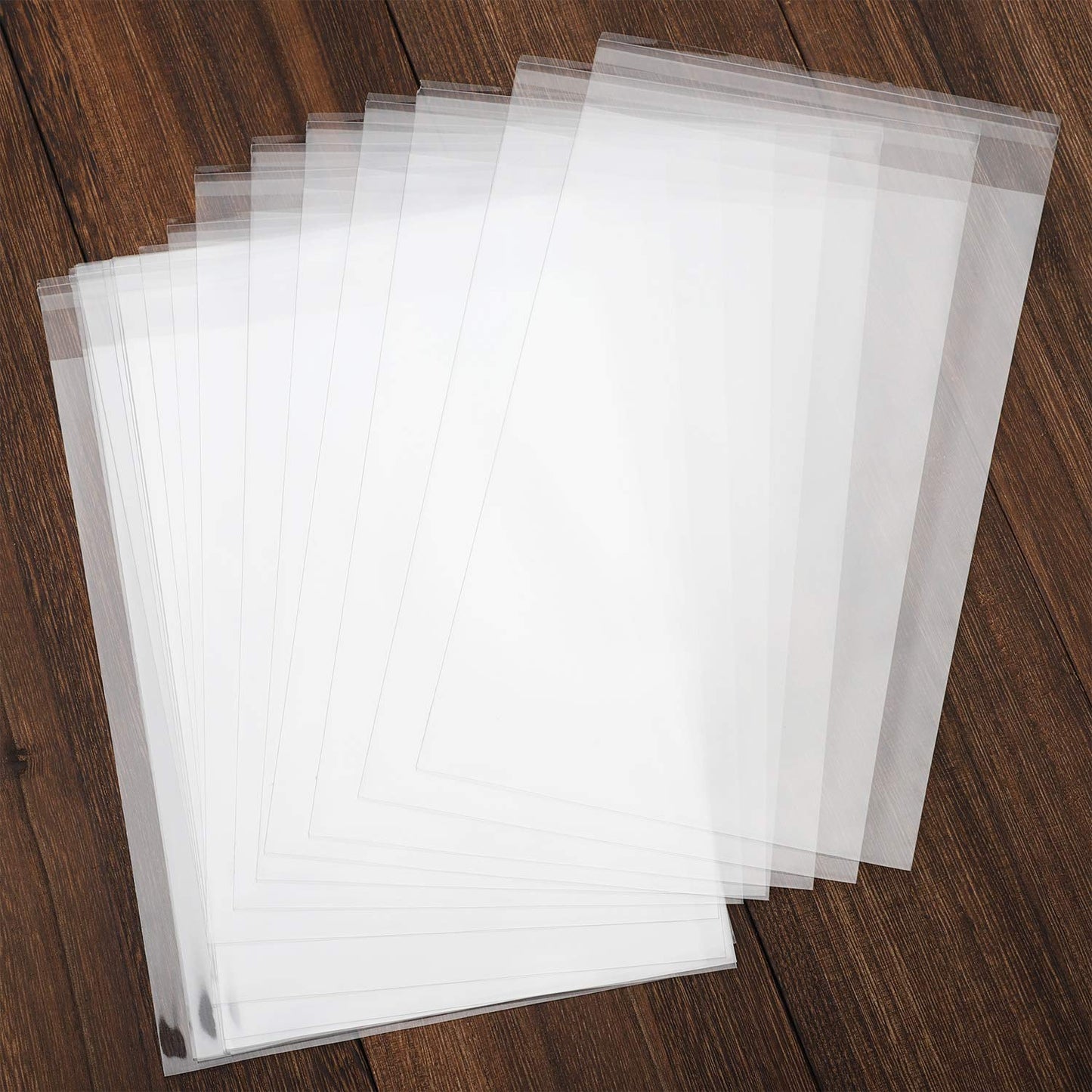 100 pcs Clear 7" x 10" Self Seal Cello Cellophane Bags Resealable Poly Bags 2.8 mils for Cookie, Candy, Gift Bakery, Prints, Photos, Cards , Party