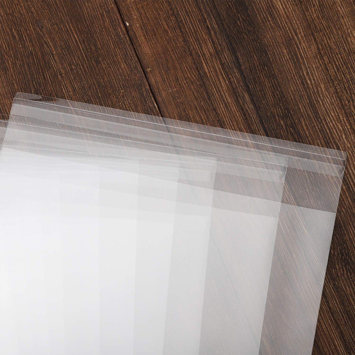 100 pcs Clear 7" x 10" Self Seal Cello Cellophane Bags Resealable Poly Bags 2.8 mils for Cookie, Candy, Gift Bakery, Prints, Photos, Cards , Party